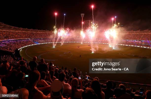 Fans watch fireworks during the Big Bash League match between the Brisbane Heat and the Melbourne Renegades at The Gabba on January 10, 2019 in...