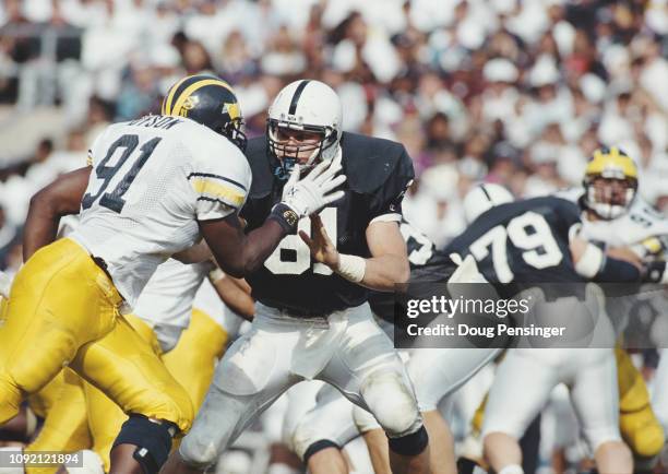 Kyle Brady, Tight End for the Penn State Nittany Lions blocks Matt Dyson, Linebacker for the University of Michigan Wolverines during their NCAA Big...
