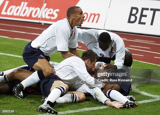 England celebrate as they go on the rampage during the FIFA World Cup 2002 Group Nine Qualifying match against Germany played at the Olympic Stadium,...