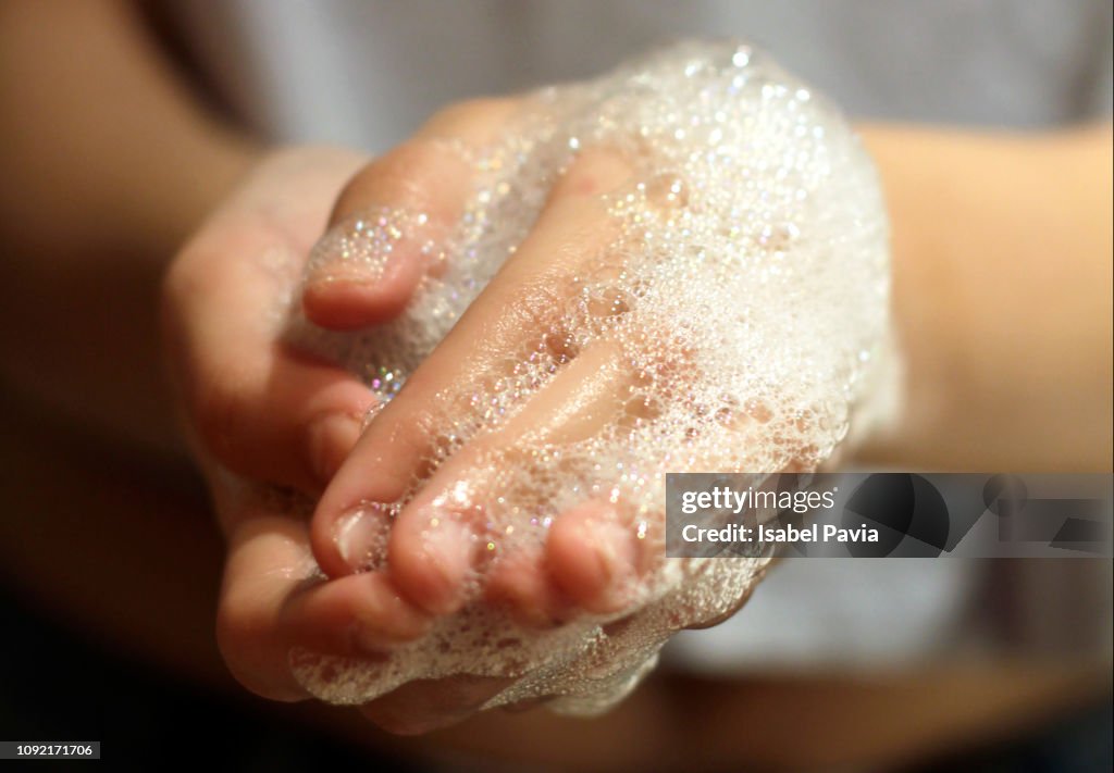 Woman washing her hands