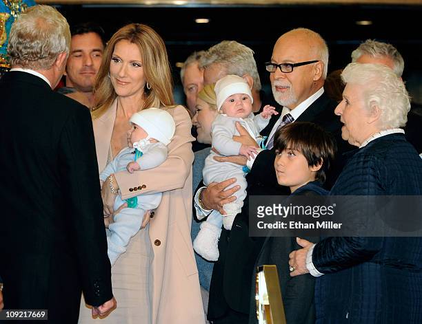 Singer Celine Dion, holding her son Nelson Angelil, her husband and manager Rene Angelil, holding their son Eddy Angelil, their son Rene-Charles...