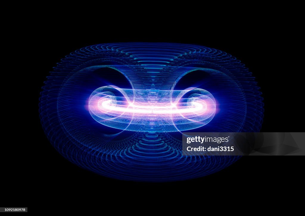 High Energy Particles Flow Through A Tokamak Or Doughnut-Shaped Device. Antigravity, Magnetic Field, Nuclear Fusion, Gravitational Waves And Spacetime Concept