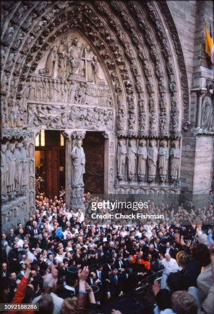 Elevated view of Pope John Paul II as waves among the crowd during a visit to Notre Dame Cathedral, Paris, France, May 30, 1980.