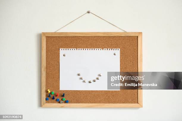 cork board with smiley face - push pins for cork boards stock pictures, royalty-free photos & images