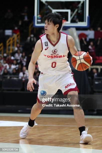 Yuma Fujii of Kawasaki Brave Thunders handles the ball during the Basketball 94th Emperor's Cup Quarter Final between Kawasaki Brave Thunders and...