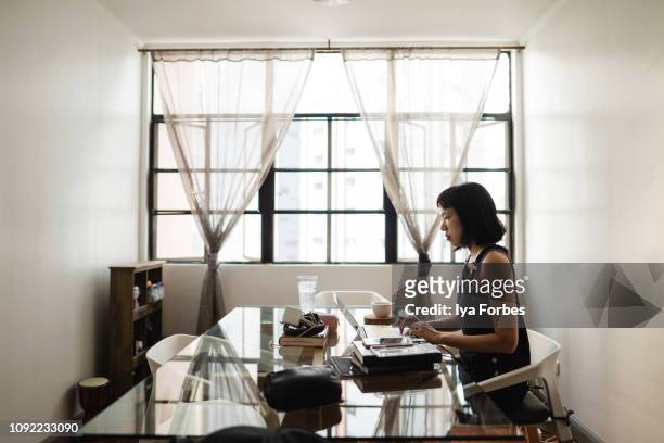 Filipino woman working on desk