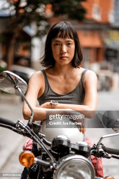 Filipino motorcyclist on motorcycle