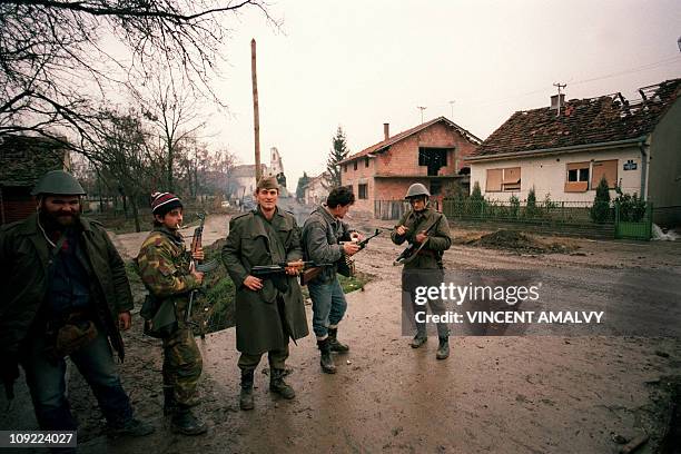 Members of the ''Arkan's Tigers'', Serb para-military group', patrol on November 24, 1991 at Laslovo, 18 kilometers from Osijek, capital of the...