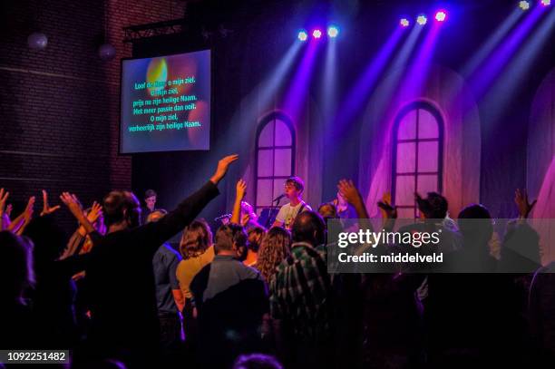 worship and dance - pentecostalism stock pictures, royalty-free photos & images