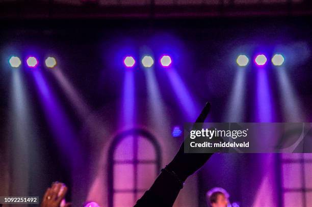 watching worship and dance - pentecostalism stock pictures, royalty-free photos & images