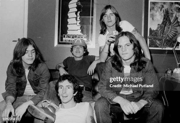 Group portrait, London, 8th April 1976. L-R Malcolm Young, Bon Scott, Angus Young, Phil Rudd, Mark Evans.