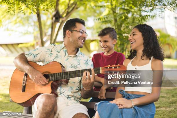 happy family - family singing stock pictures, royalty-free photos & images