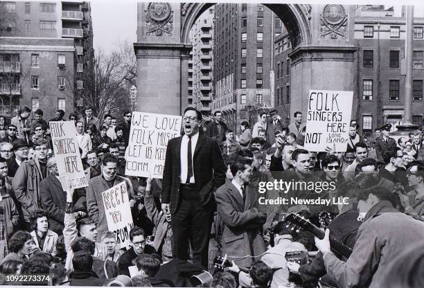 Folklorist Israel Young leads a protest against the banning of folk music in Washington Square Park in Greenwich Village on April 9, 1961.