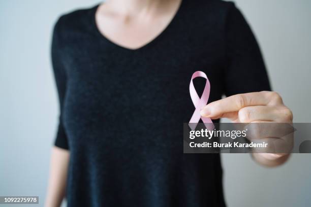 breast cancer awareness. - cancer ribbon stock pictures, royalty-free photos & images