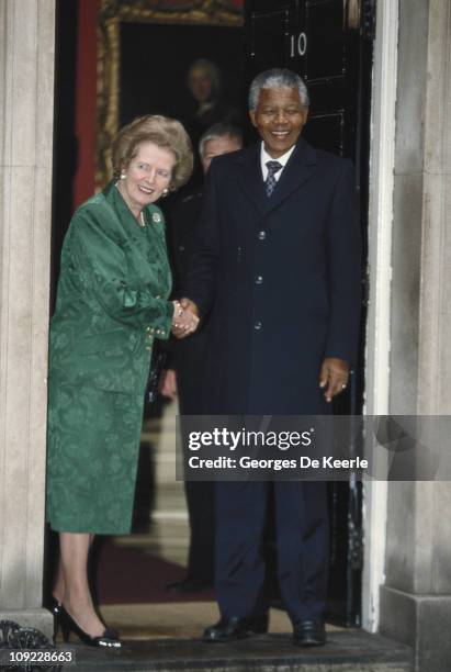 British Prime Minister Margaret Thatcher with African National Congress leader Nelson Mandela at 10 Downing Street, London, 4th July 1990.