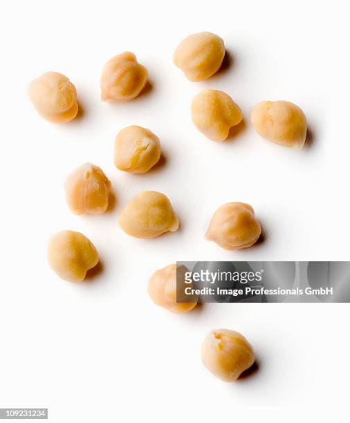 chick-peas on white background, close-up - chickpea stock pictures, royalty-free photos & images