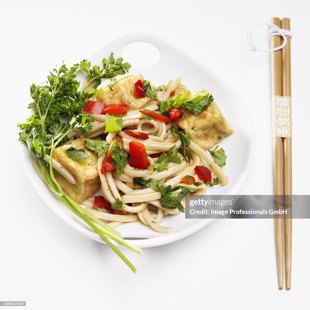 Asian noodle with tofu stir fry, close-up