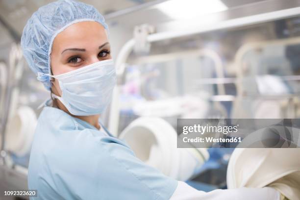 portrait of scientist working in insulator laboratory - insulator stock pictures, royalty-free photos & images