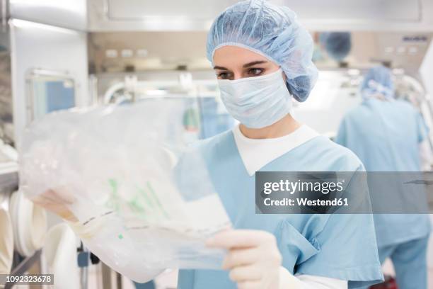 scientist working in insulator laboratory - insulator stock pictures, royalty-free photos & images