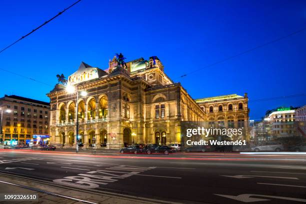 austria, vienna, vienna state opera, blue hour - opera house stock-fotos und bilder