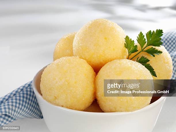 bowl of potato dumplings, close-up - dumpling stock-fotos und bilder