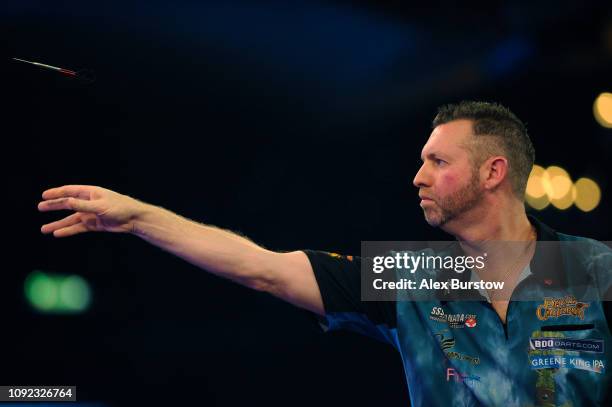 David Cameron of Canada in action against Kyle McKinstry of Northern Ireland during Day Six of the BDO World Darts Championship at Lakeside Country...