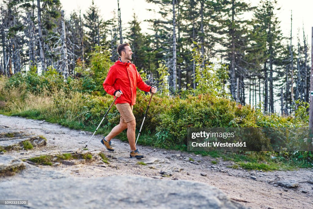 Smiling man hiking in the mountains