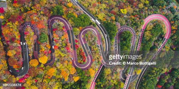 Winding mountain road in autumn, Japan