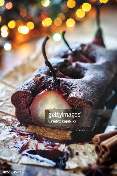 pear chocolate cake  with mulled wine glaze - christmas cake stock pictures, royalty-free photos & images