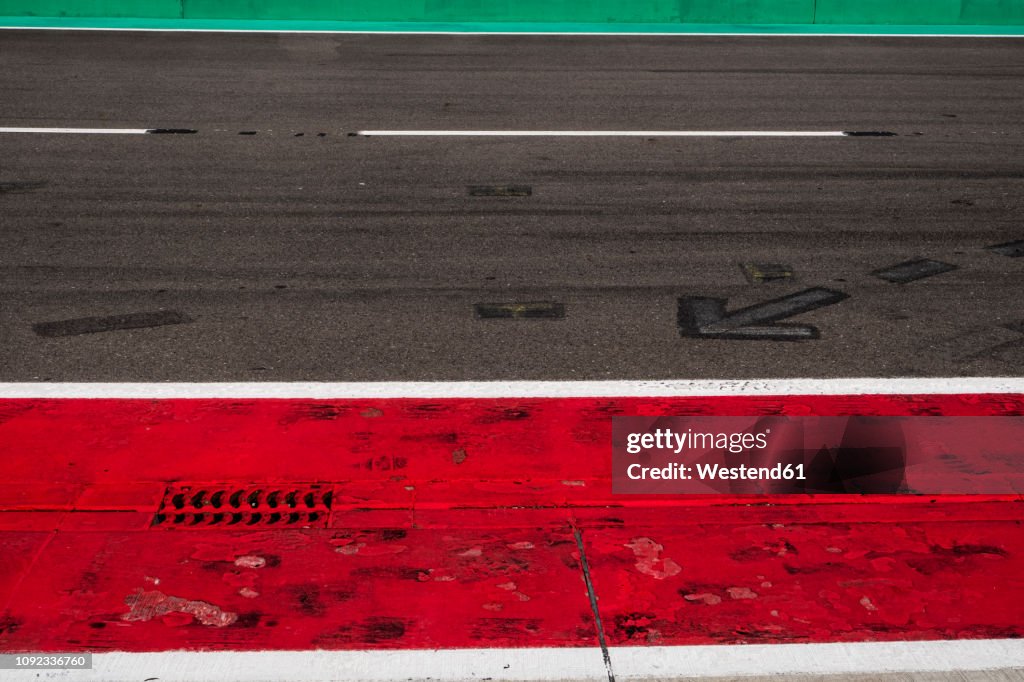 Markings and gully on racetrack