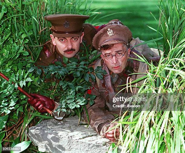 As Captain Blackadder Rowan Atkinson and Right: TONY ROBINSON As Private Baldrick British Actors Stars of the BBC TV series 'Blackadder' Stars of the...