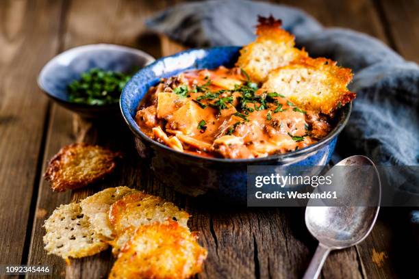 lasagna soup, deconstructed lasagna served as soup, with parmesan crisps - lasagne stock pictures, royalty-free photos & images