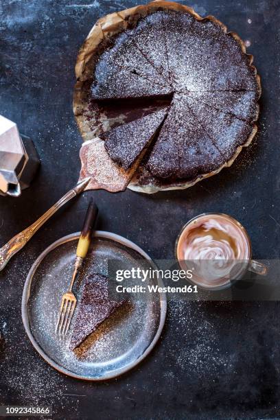 swedish kladdkaka, dark chocolate cake, swedish brownie, with coffee, close-up - coffee cake stockfoto's en -beelden