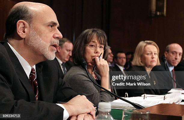 Federal Reserve Board Chairman Ben Bernanke speaks while Sheila Bair, chairman of the Federal Deposit Insurance Corporation, Mary Schapiro, chairman...