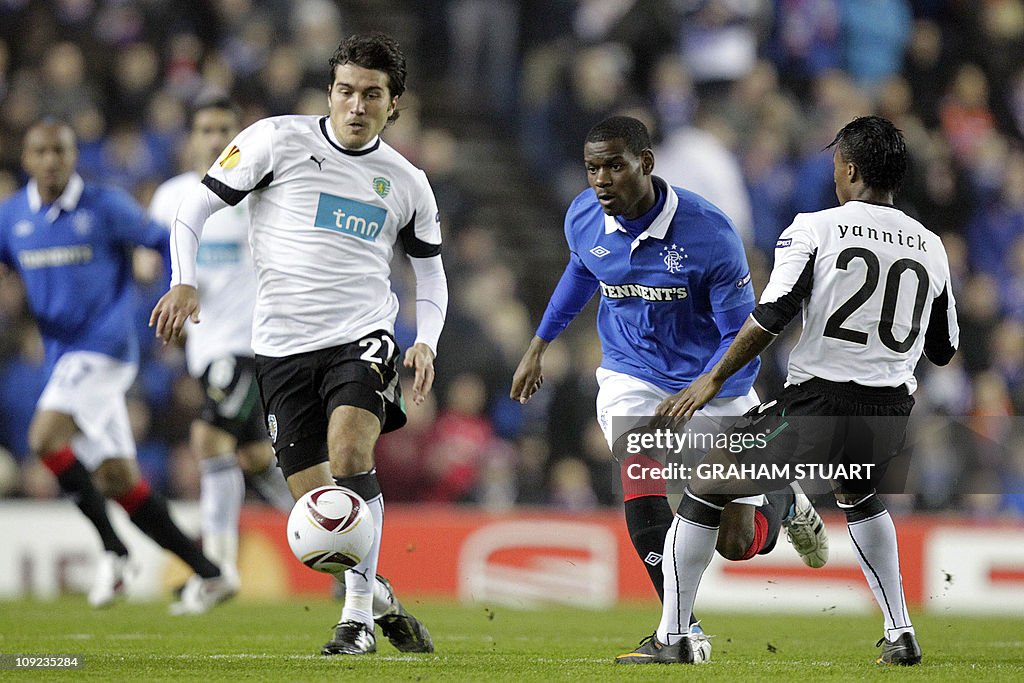 Rangers' US midfielder, Maurice Edu (2nd