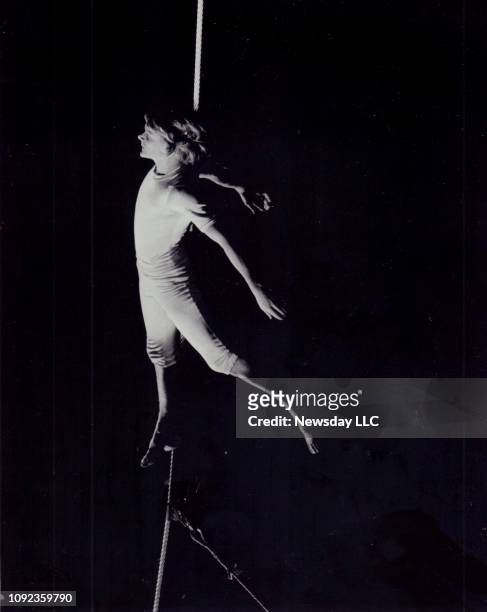 French high wire artist Philippe Petit performs at Madison Square Garden in New York City on May 8 his first performance after injuring himself...