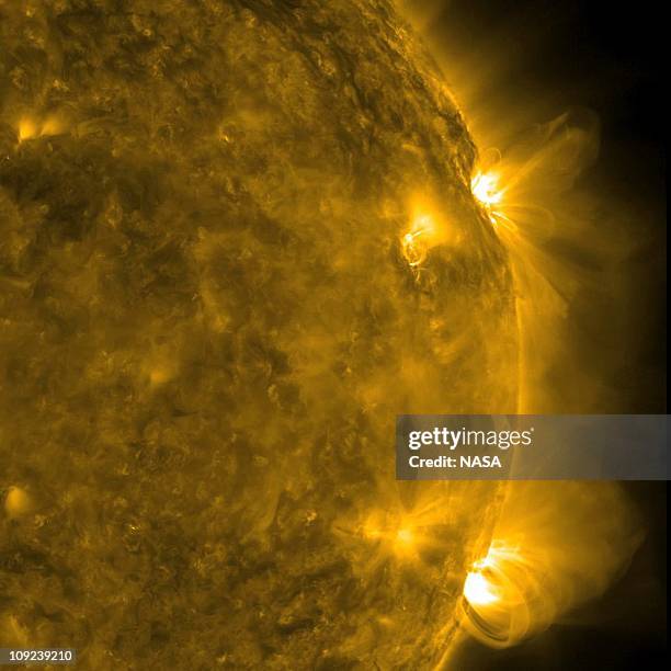 In this handout image provided by NASA / SDO, a pair of active regions on the Sun were captured in extreme ultraviolet light from the Solar Dynamic...