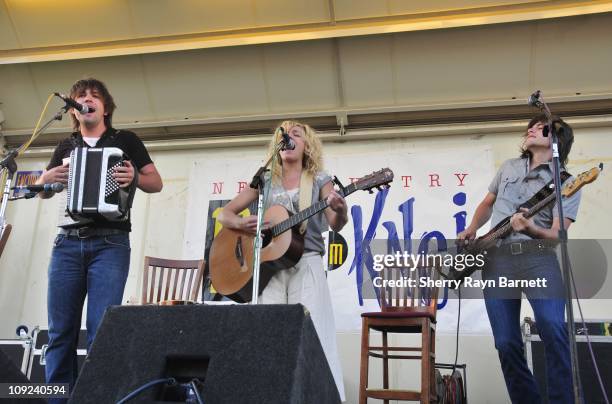 Neil Perry, Kimberly Perry and Reid Perry from the musical group The Band Perry perform onstage at the Golf and Guitars charity event on May 18, 2010...