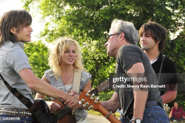 Reid Perry, Kimberly Perry and Neil Perry from the musical group The Band Perry meet songwriter Radney Foster at the Golf and Guitars charity event...