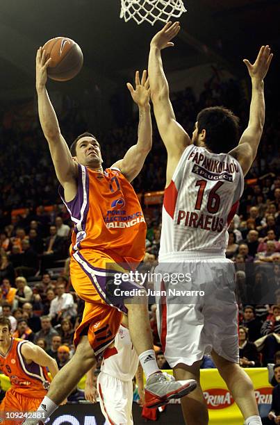 Rafa Martinez, #17 of Power Electronics Valencia competes with Kostas Papanikolaou, #16 of Olympiacos Piraeusduring the 2010-2011 Turkish Airlines...