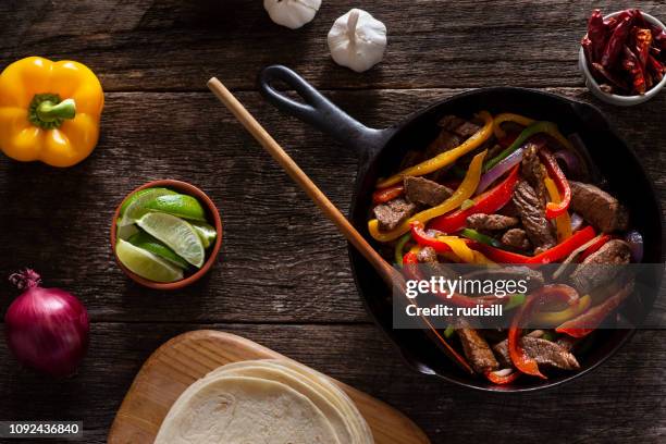 steak fajitas - fajita stock pictures, royalty-free photos & images