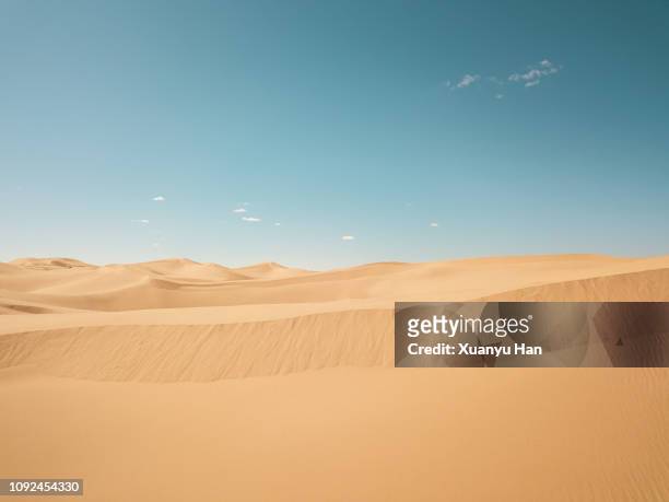 view of desert against sunny sky - clear sky stock pictures, royalty-free photos & images
