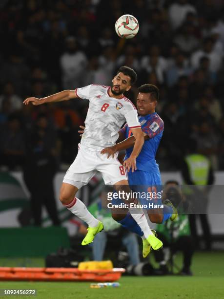 Majed Hassan Ahmed of United Arab Emirates and Lalpekhlua Jeje of india compete for the ball during the AFC Asian Cup Group A match between India and...