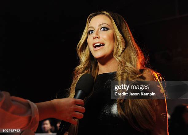 Aubrey O'Day attends the Son Jung Wan Fall 2011 fashion show during Mercedes-Benz Fashion Week at The Studio at Lincoln Center on February 17, 2011...