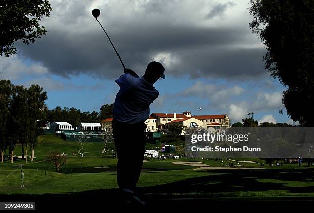 Stuart Appleby of Australia hits his tee shot on the ninth hole during round one of the Northern Trust Open at Riviera Counrty Club on February 17,...