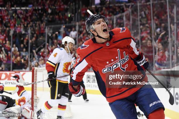 Dmitrij Jaskin of the Washington Capitals celebrates after scoring a goal in the first period against the Calgary Flames at Capital One Arena on...