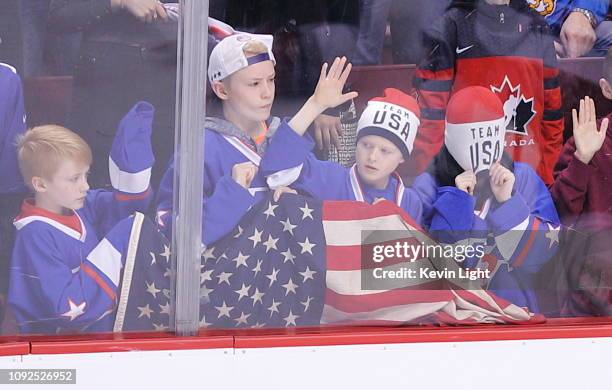 United States fan pulls a toque over their head following a loss to Finland in the gold medal game at the IIHF World Junior Championships at Rogers...