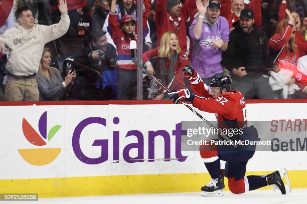 Evgeny Kuznetsov of the Washington Capitals celebrates after scoring a goal in the third period against the Calgary Flames at Capital One Arena on...