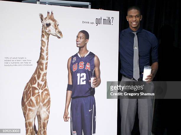 Chris Bosh of the Miami Heat poses next to a poster for his new Got Milk ad at Jam Session presented by Adidas during NBA All Star Weekend on...