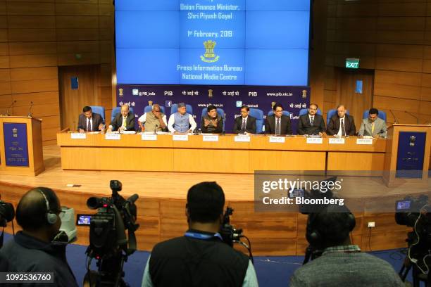 Piyush Goyal, India's interim finance minister, center, speaks during a news conference in New Delhi, India, on Friday, Feb. 1, 2019. India's...